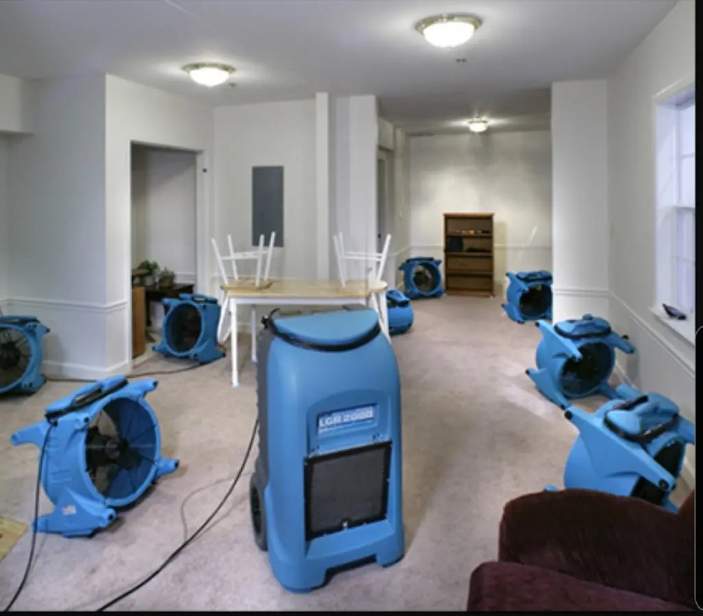 Air movers and dehumidifier setup for Water Damage Restoration in Holdenville